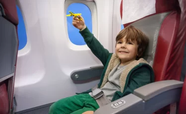 Летать без родителей могут дети через Kaspi Travel