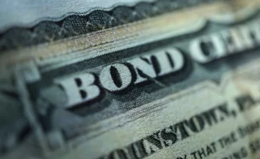 На KASE временно приостановят торги облигациями Минфина США
