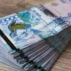 В Казахстане женщина за миллион тенге вместо массажного кресла получила накидку
