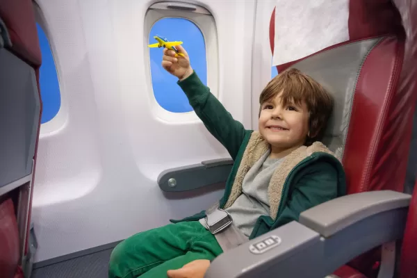 Летать без родителей могут дети через Kaspi Travel